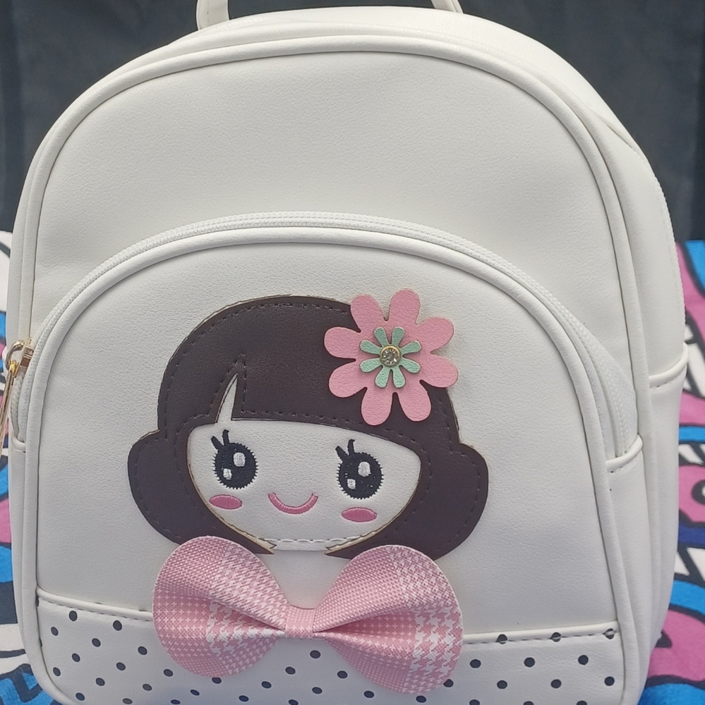 White Mini Backpack For girl wearing Pink Bow and Flower